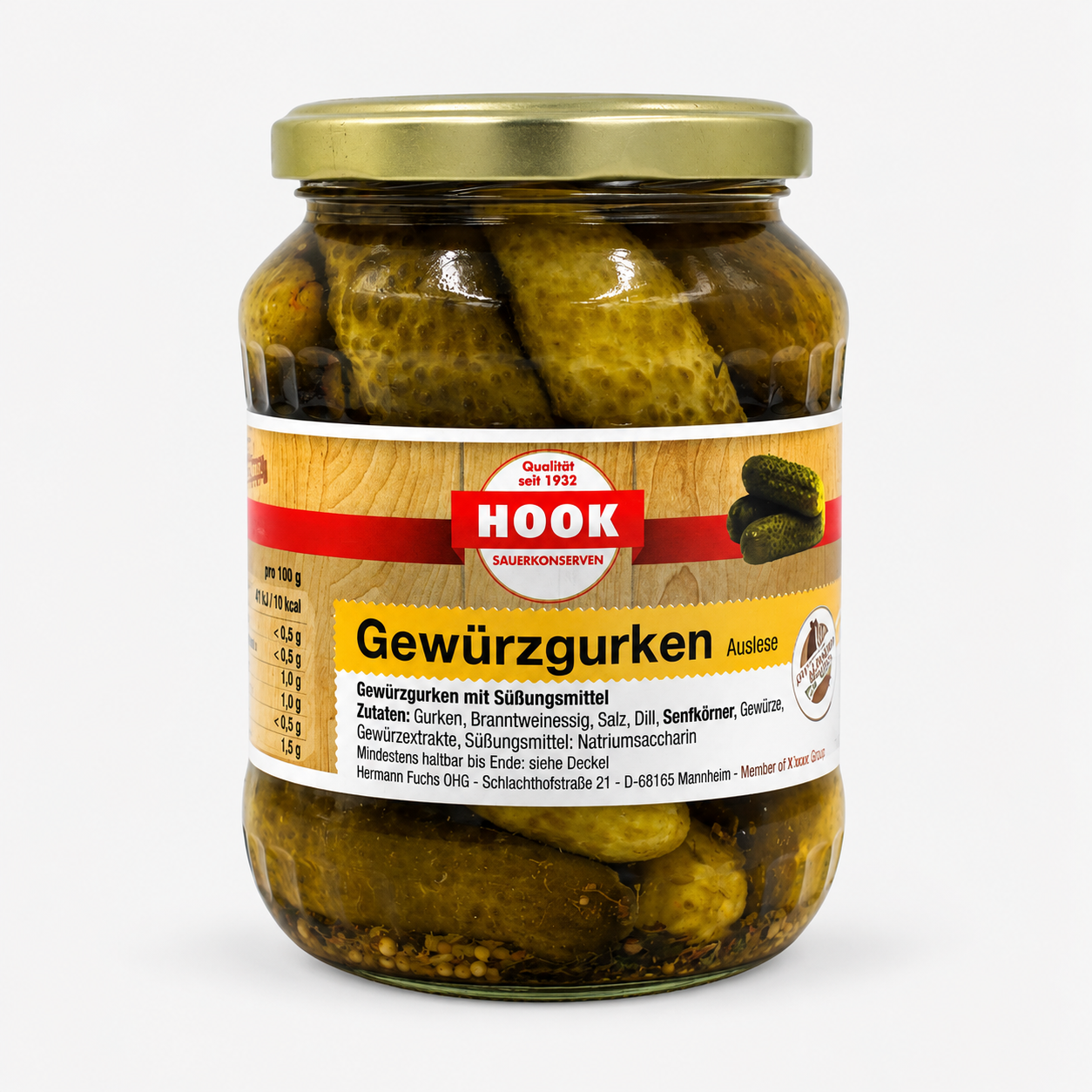Gewürzgurken im Glas mit Golddeckel
